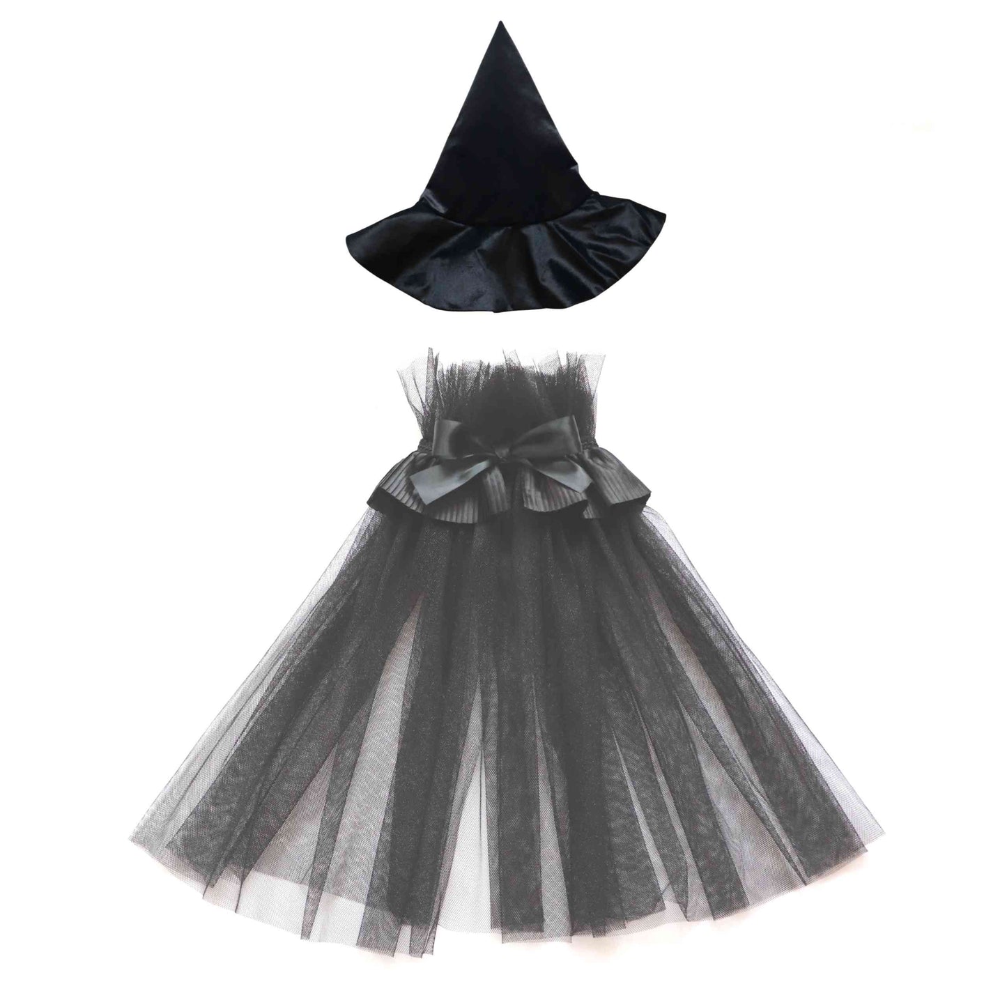 a little girl's dress with a hat on top of it