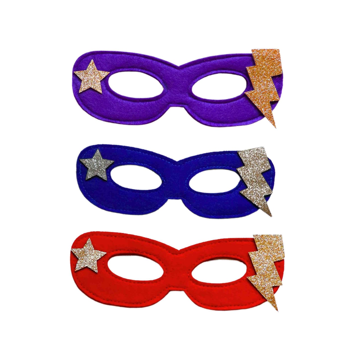 a group of three masks with stars on them