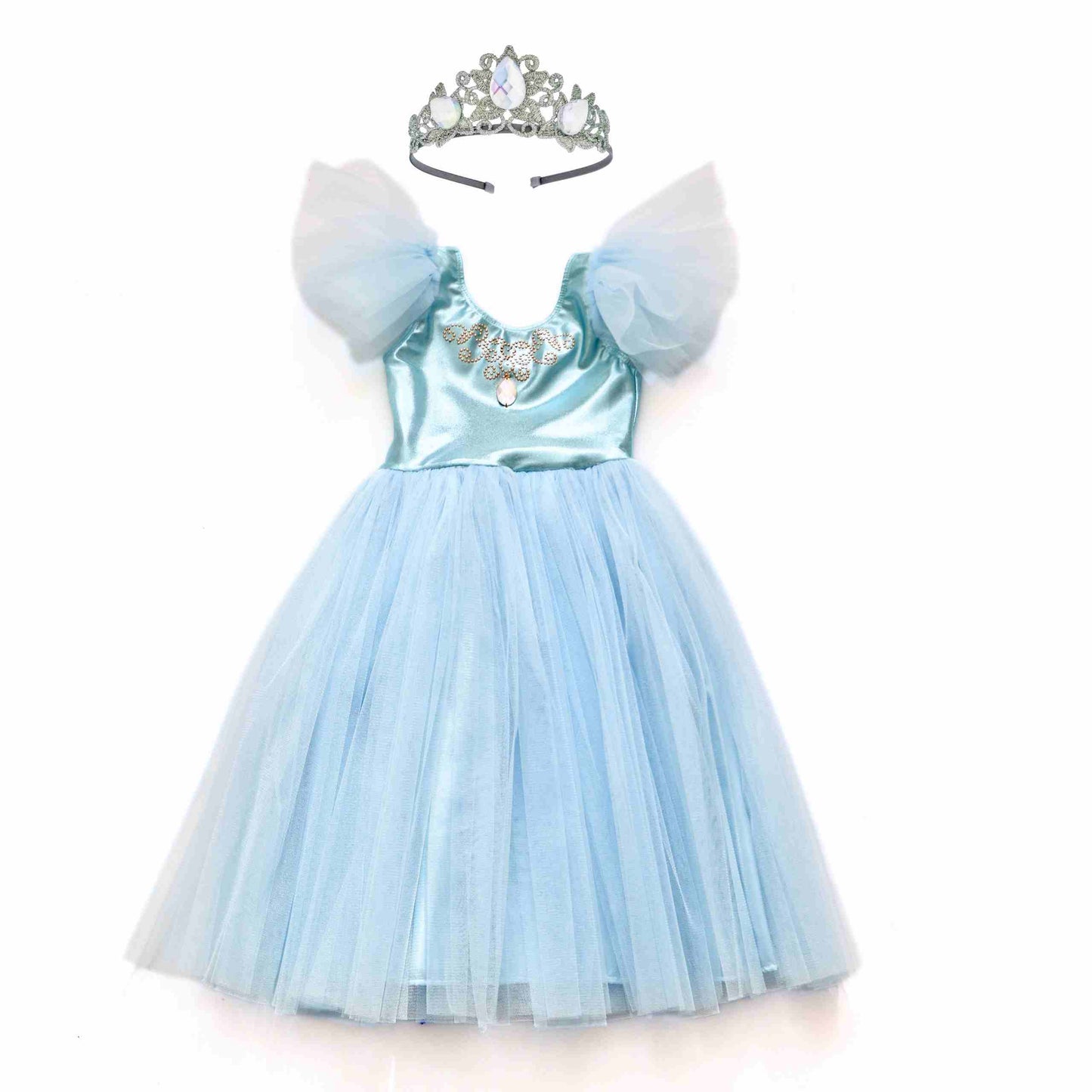 a little girl wearing a blue dress and a tiara