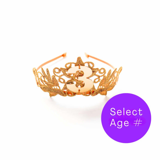 a gold ring with a purple circle around it