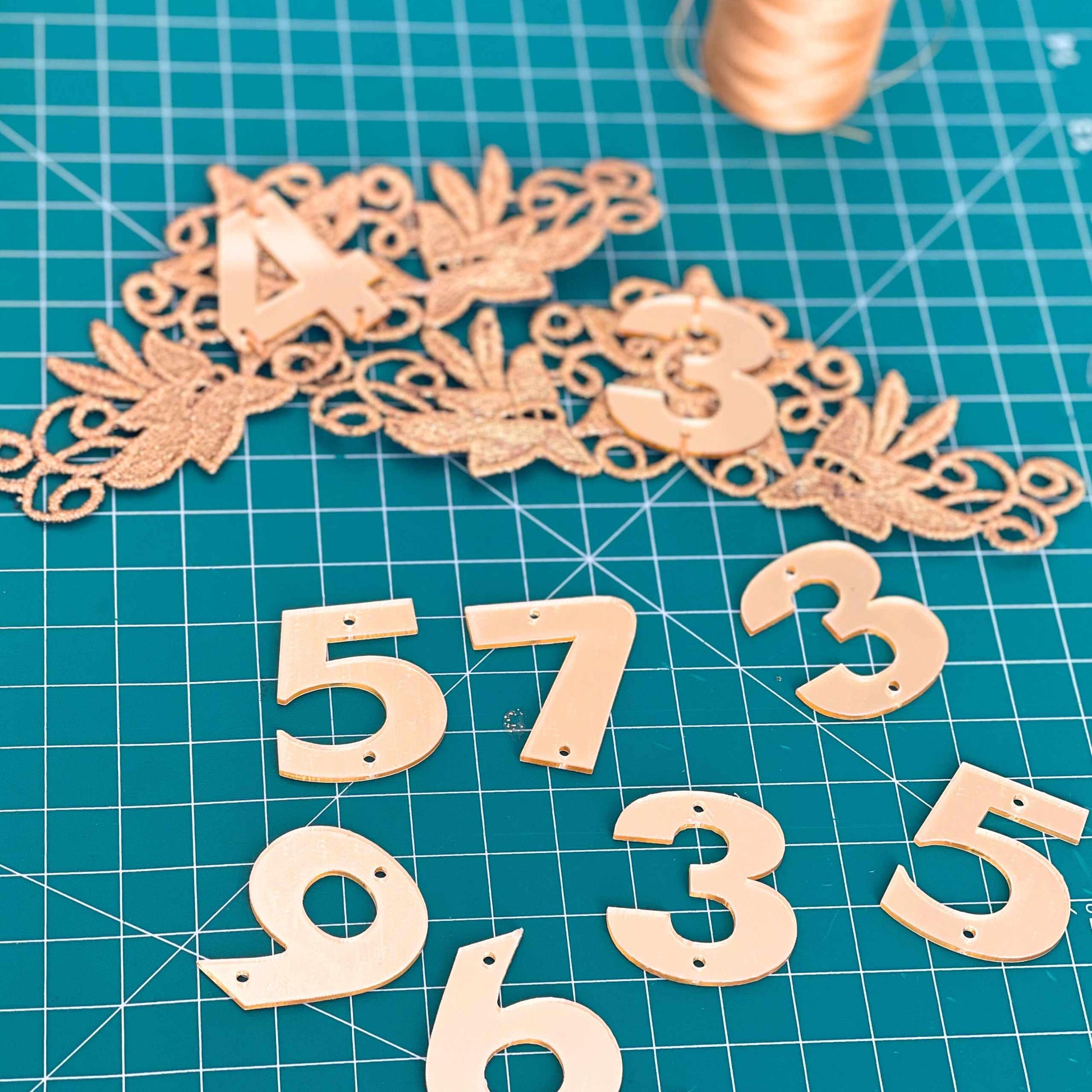 the numbers are cut out and placed on the table