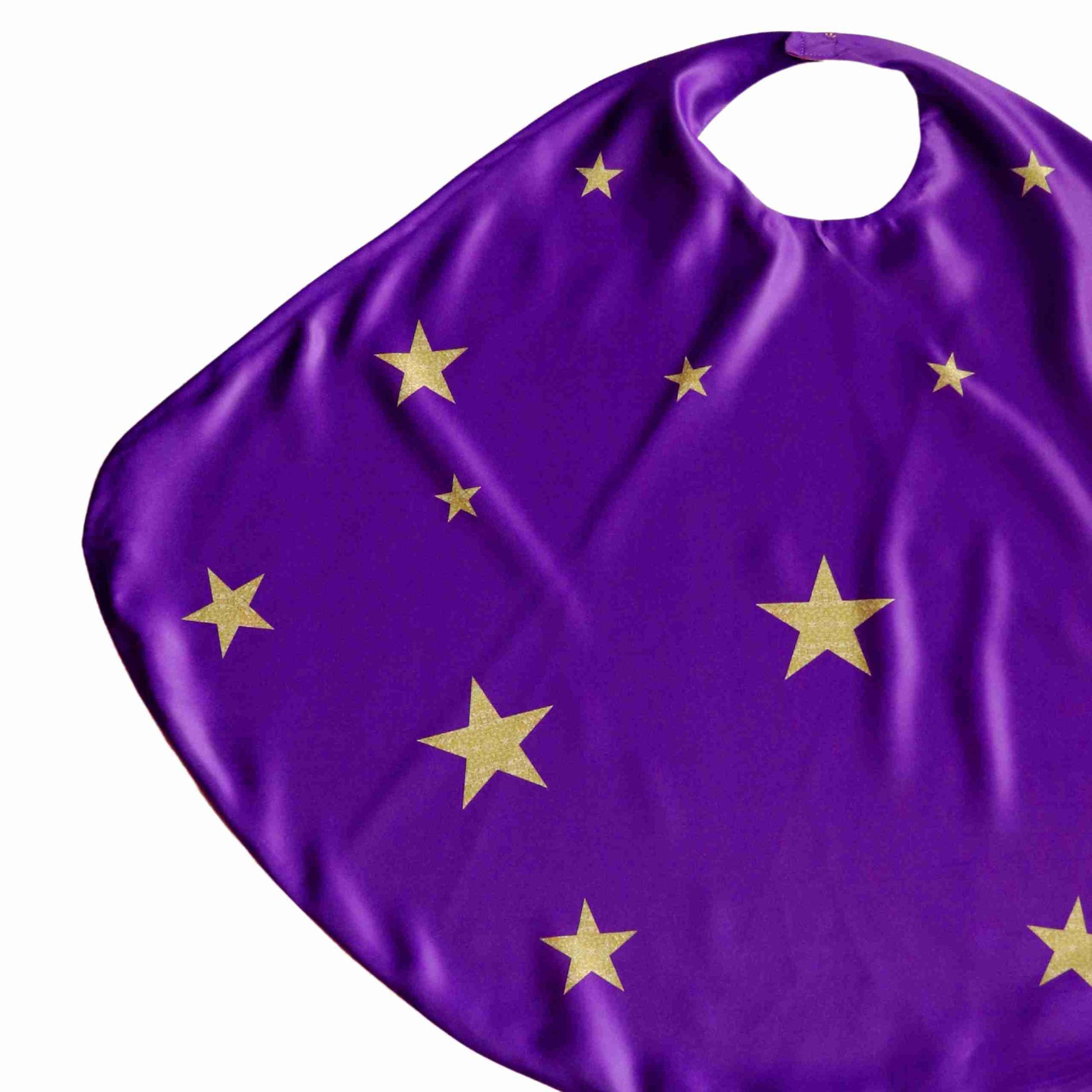 a purple bib with gold stars on it