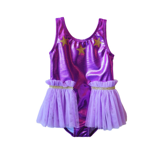 A purple leotard with gold stars and ruffles, featuring an attached skirt.