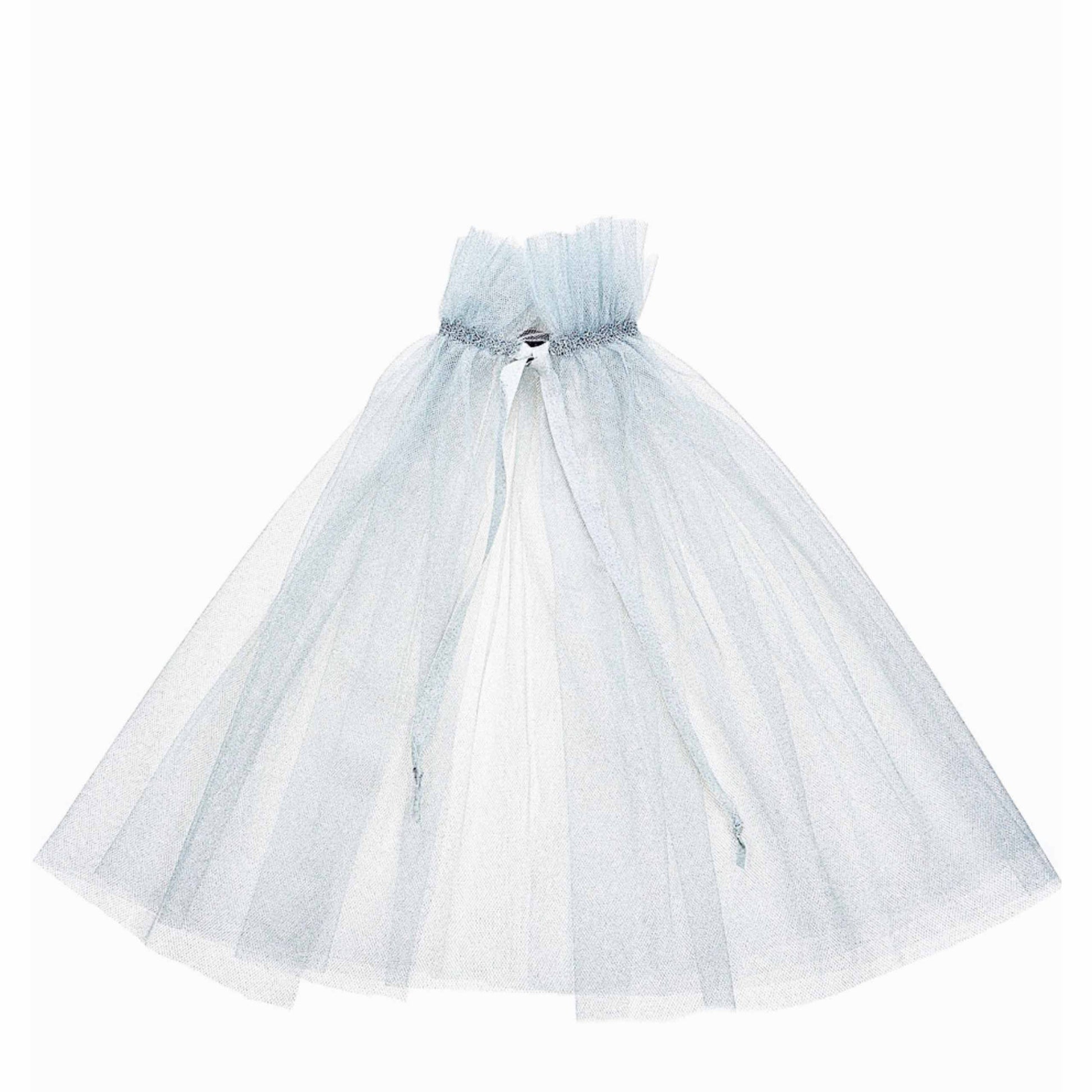a white tulle skirt with a bow at the waist