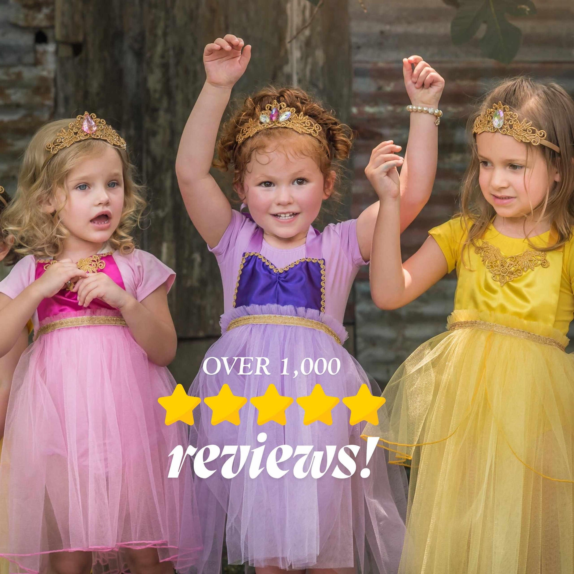 three little girls dressed in princess dresses and tiaras