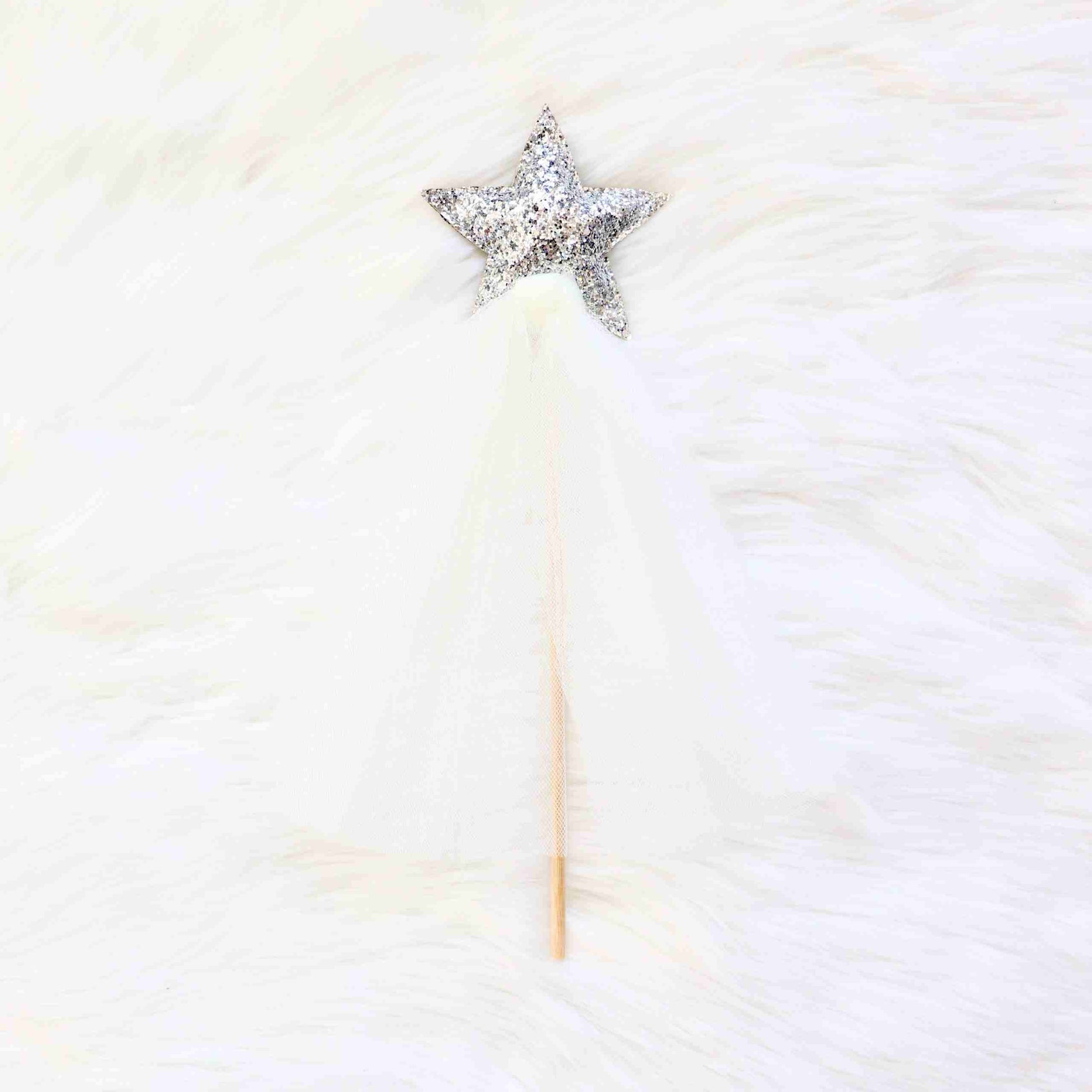a white fur with a star on top of it