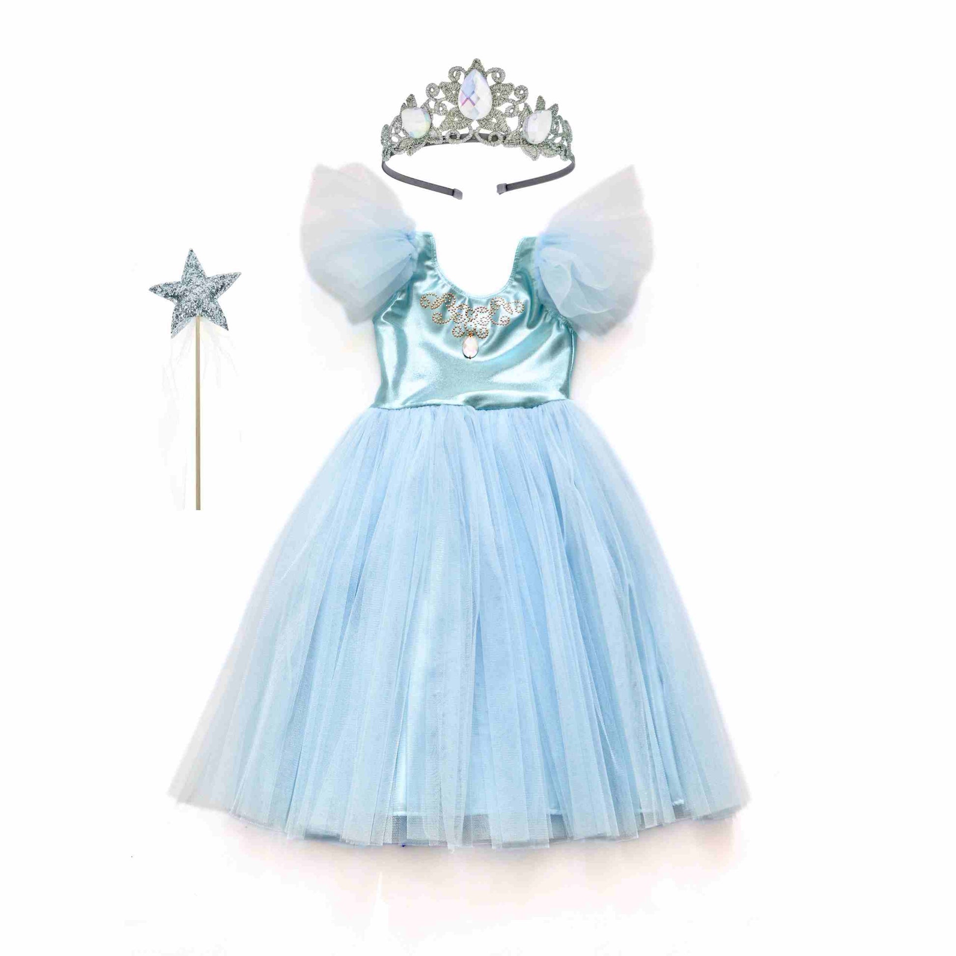 a little girl wearing a blue dress and a tiara